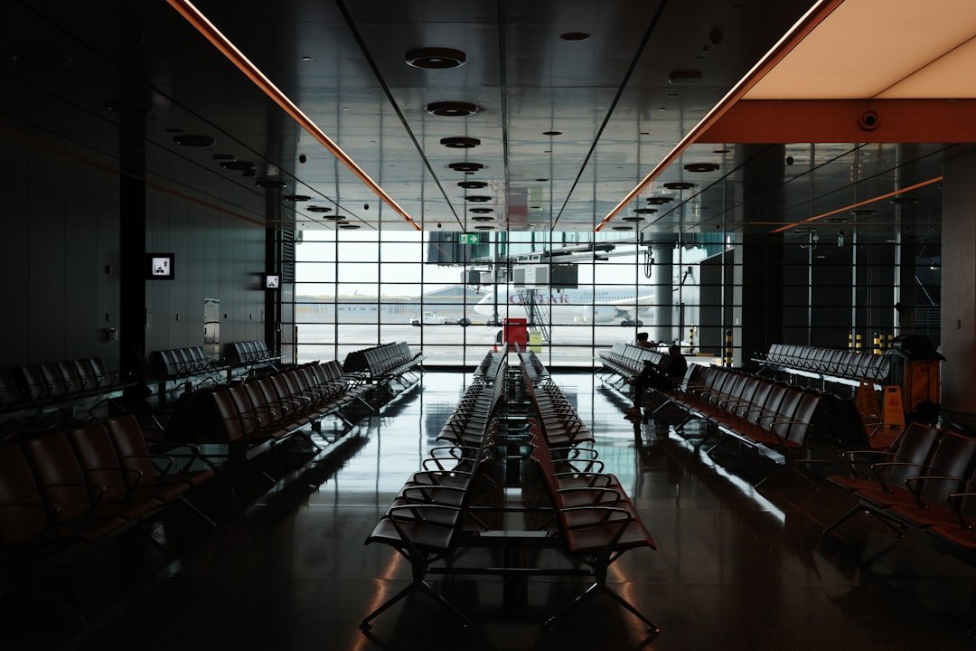 Smartphone showing digital travel document at airport for UK dual citizenship passport verification