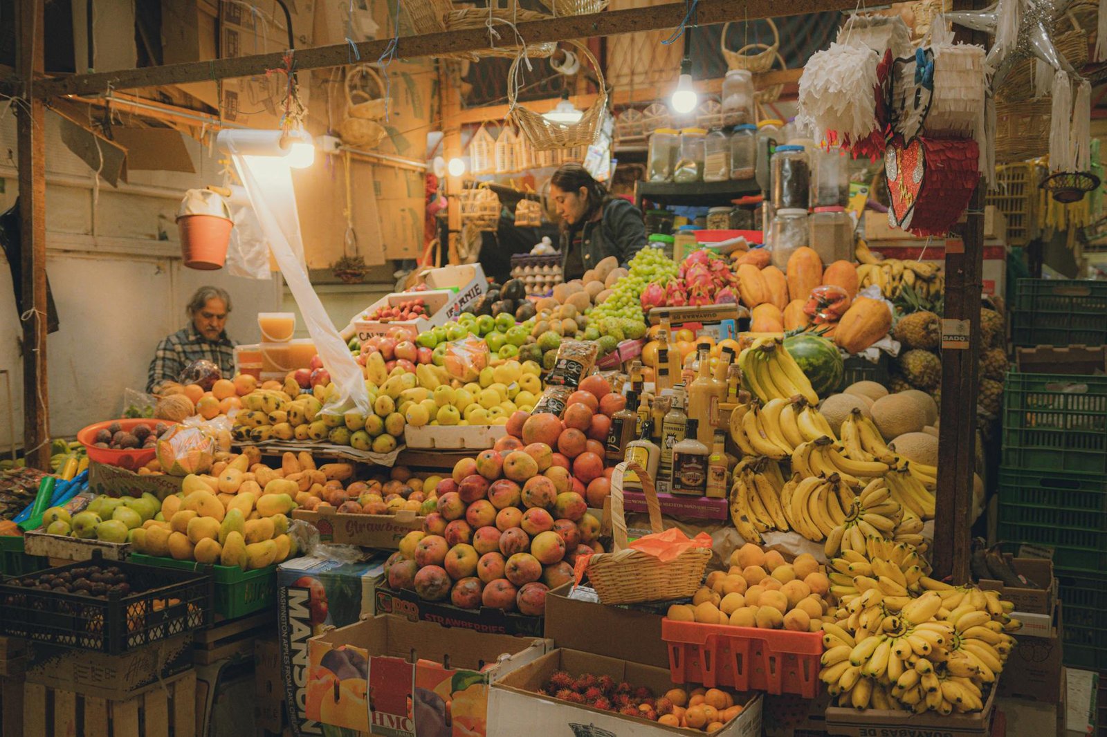 Colorful Mexican market with fresh produce, cost of living in Mexico as an expat