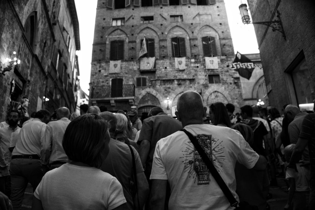 Queue outside an Italian government office for moving to Italy residence permits
