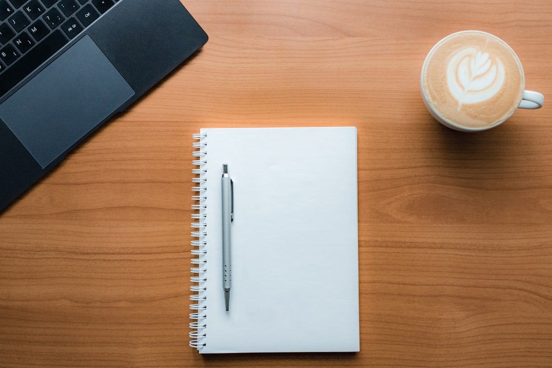 Studying Portuguese language with notebook and coffee in Brazil