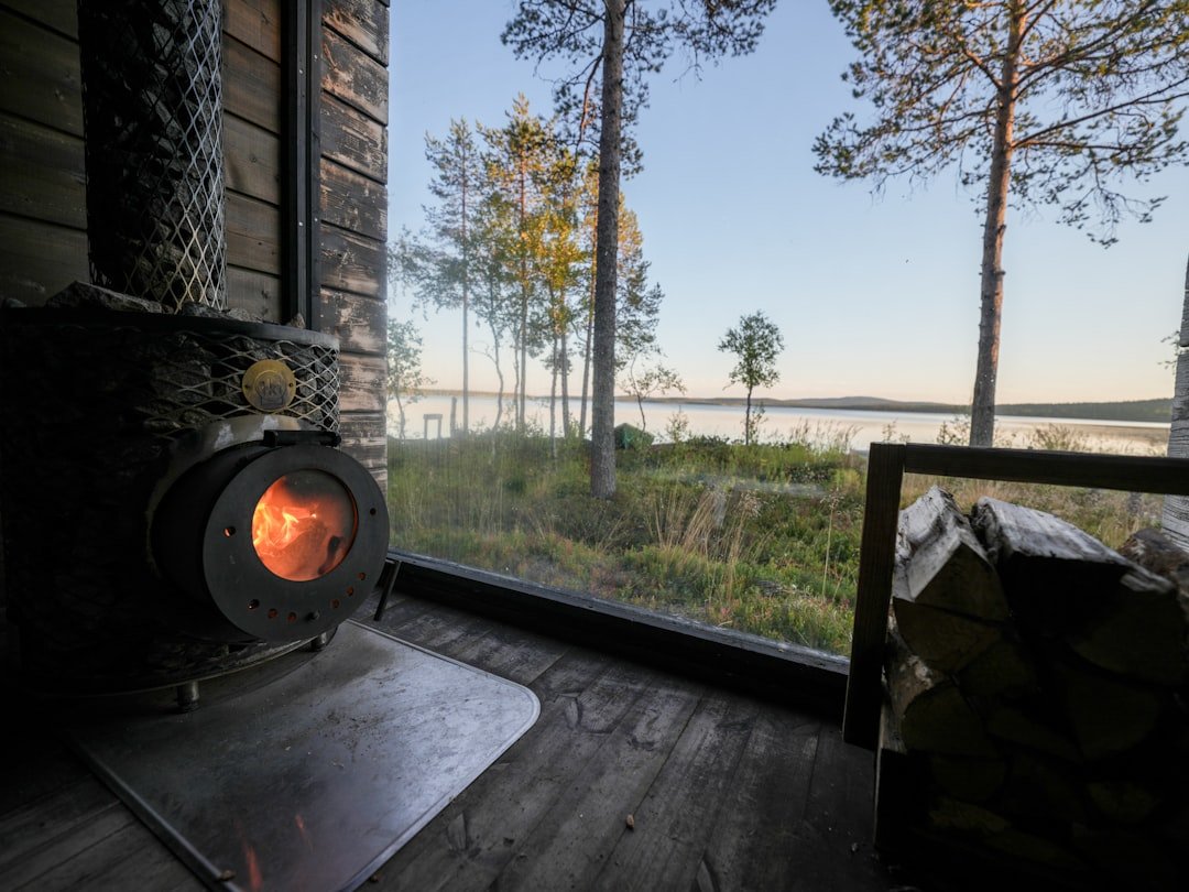 Finnish lakeside sauna in summer golden hour - expat life in Finland