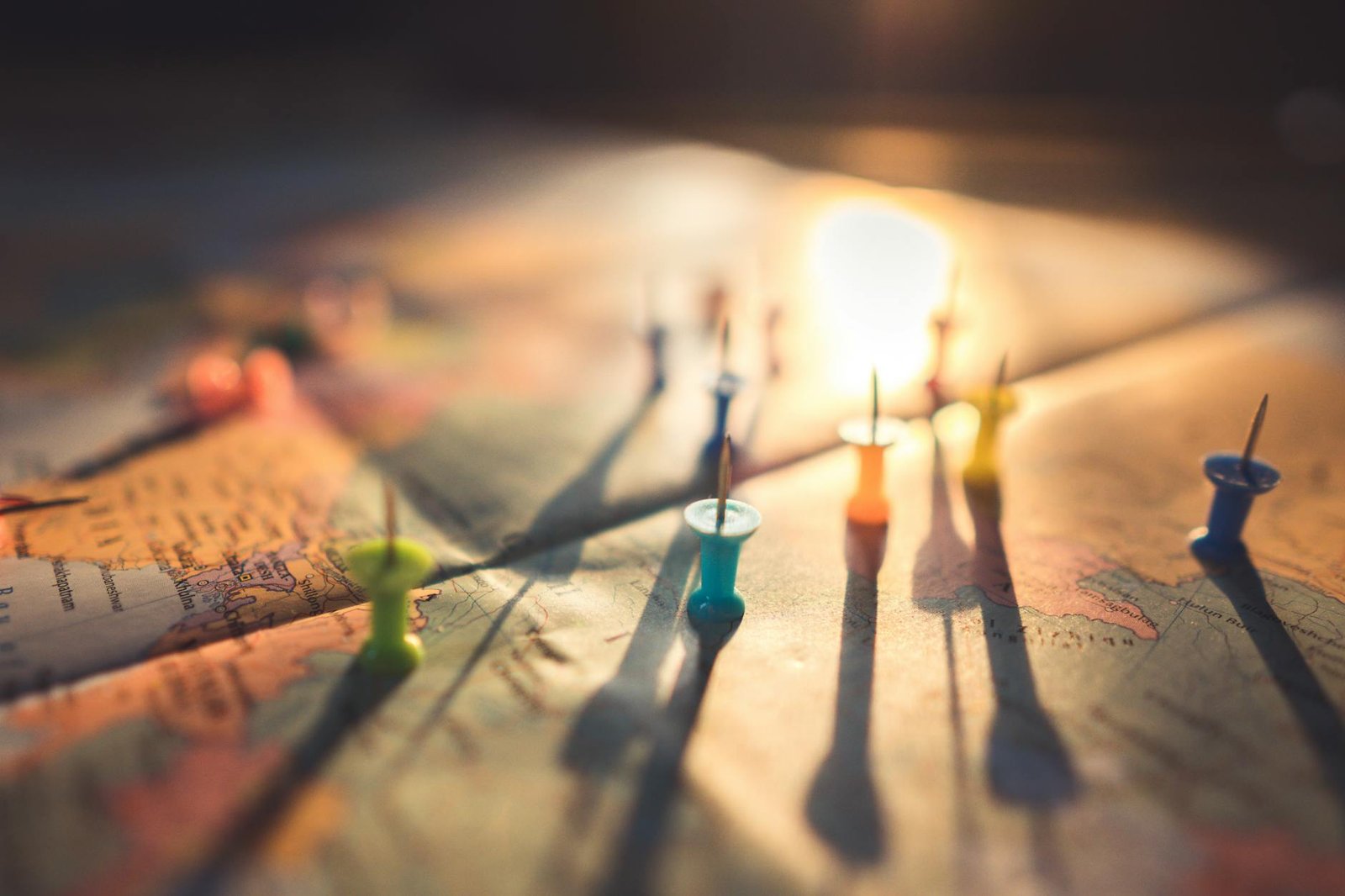 World map with pins for planning international relocation
